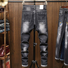 Load image into Gallery viewer, Distressed Patchwork Black Denim Jeans
